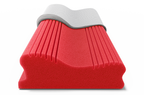 Vue en coupe d’un oreiller ergonomique rouge avec zones de soutien profilées et housse partiellement retirée.
