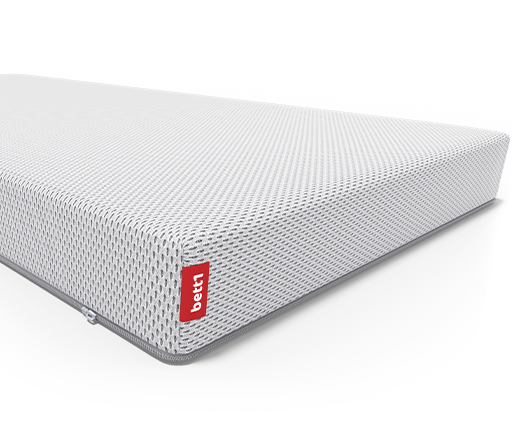 Matelas bébé SuperBreeze avec housse de matelas repliée. Label Oeko-Tex®. Illustration du matelas bébé avec sigle de lavage à 60°C