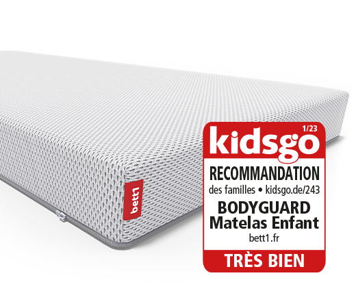 Au-dessus du matelas pour enfants et bébés, un sceau de kidsgo avec le texte : recommandation des familles kidsgo.de Bodyguard matelas enfant bett1.fr
