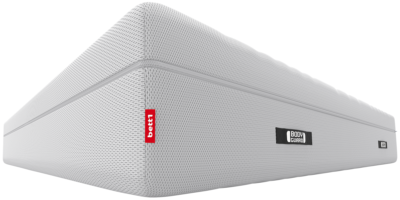 Gros plan sur un coin du matelas BODYGUARD® Boxspring en mettant l'accent sur la hauteur du matelas.