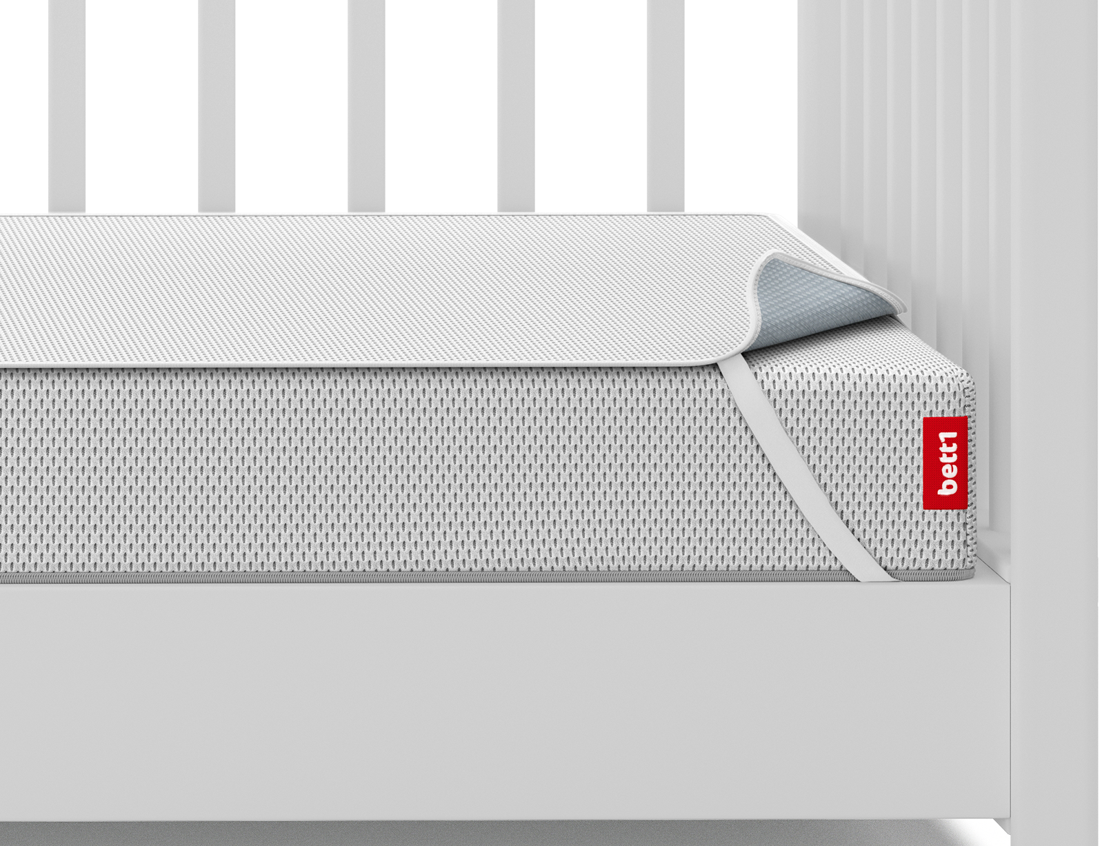 Le matelas pour enfants BODYGUARD® avec l'alèse pour matelas pour enfants dessus est placé dans un lit d'enfant.