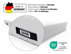 Matelas BODYGUARD® anti-cartel : zoom sur la poignée. Label Oeko-Tex®. En haut à gauche : la carte de l'Allemagne aux couleurs noir rouge jaune et texte : Made in Germany