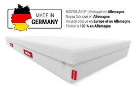 Matelas BODYGUARD® blanc avec une étiquette rouge, illustré avec une carte de l’Allemagne en rouge, noir et jaune, signalant sa fabrication allemande.
