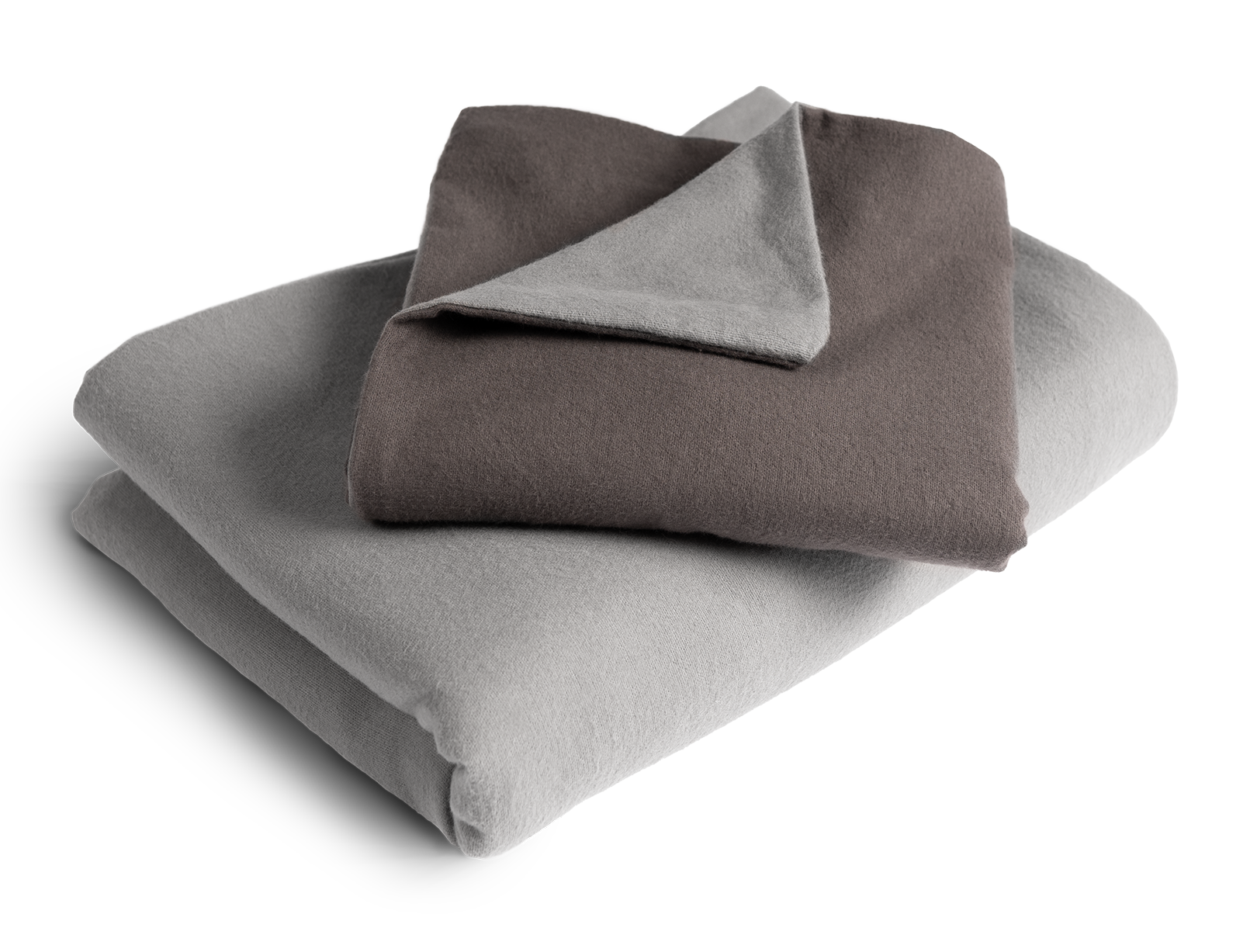 Le linge de lit BODYGUARD® en flanelle plié : la housse de couette est pliée avec la face grise vers l'extérieur, la taie d'oreiller avec la face couleur anthracite.